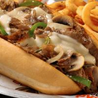Philly Chicken Cheesesteak Sandwich · Yo, Adrian ... I made you a sandwich! Chicken topped with sautéed onions, green peppers, mus...