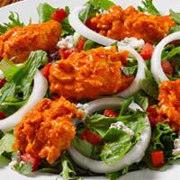 Original Buffalo Chicken Salad · Spring mix greens stacked with breaded chicken tossed in your favorite wing sauce. Topped wi...