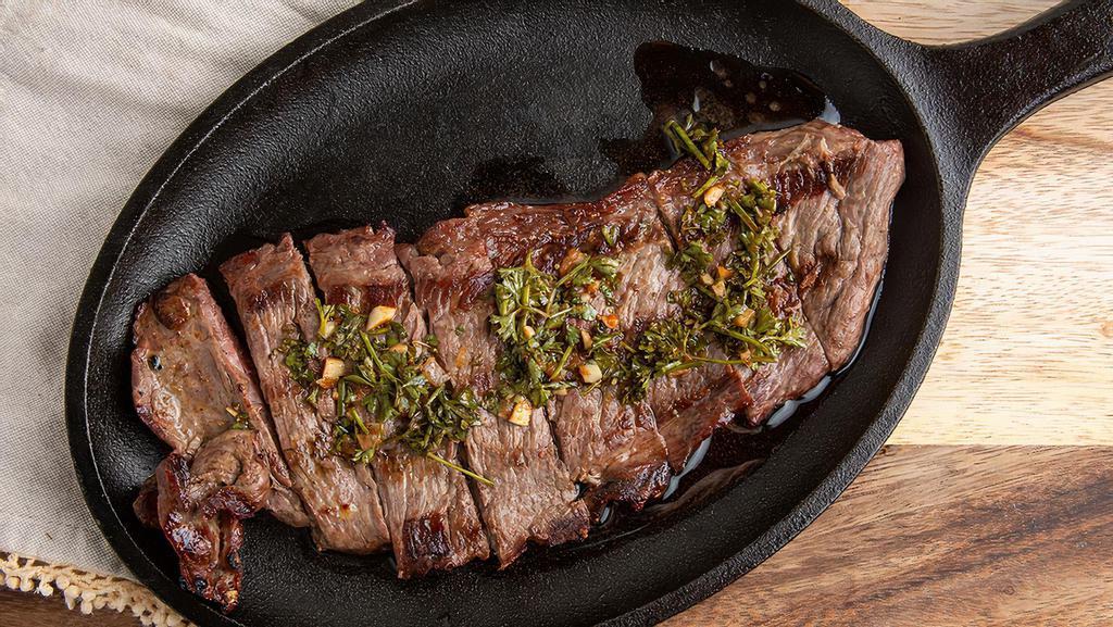 Flank Steak With Chimichurri · Flank steak with chimichurri sauce, a beauty from argentina.