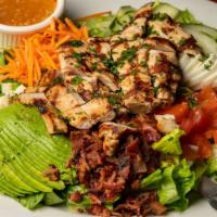 Cobb Salad · Served with Fresh Romaine Lettuce Diced Tomatoes Shredded Carrots Cucumbers Sliced Avocado A...