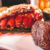 The Land Ocean · 6oz Filet Mignon, 6oz Lobster Tail, twice baked potatoes and grilled asparagus