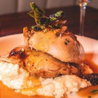 Wood Fired Rotisserie Chicken · All natural chicken, grilled asparagus, mashed potatoes and chicken jus