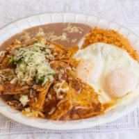 Chilaquiles Con Huevo · Spicy. Two eggs, chilaquiles, served with rice, and beans.