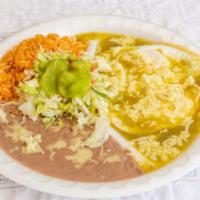 Huevos Rancheros · Two eggs served with rice, beans, garnish salad, and tortillas.