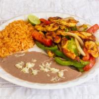 Chicken Fajitas · Sauté marinated chicken breast with fresh tomatoes, onions, and green bell peppers, served w...