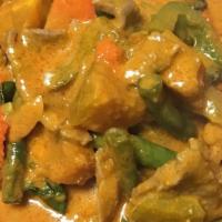 Pumpkin Curry · Fresh pumpkin chunks in red curry sauce with, sweet basil, carrots, and bell peppers.