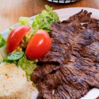 Carne Asada · (8 ounces) Marinated flap steak. Served with a choice of (3) sides, 2 handmade tortillas, an...