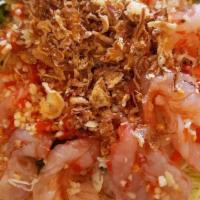 Goi Tom Tai Chanh · Rare cook shrimp salad with chili garlic dressing.