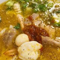 Banh Canh Cua · Tom, thit. Shrimp. Pork with tapioca noodles (springy) in thick crab soup.