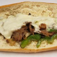 Philly Cheese Steak Sub · Steak, green peppers, grilled onion, mushroom, white American on roll.