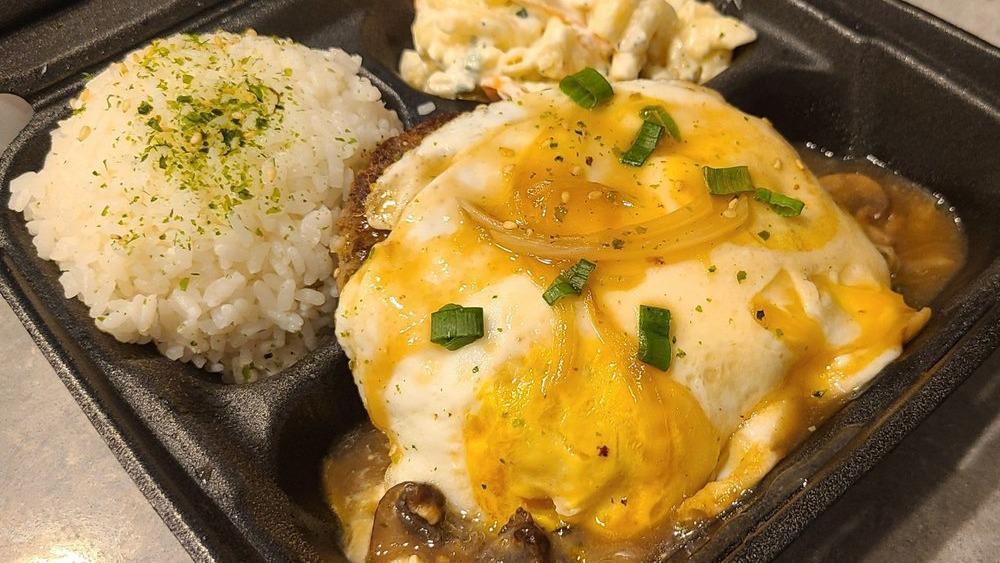 Loco Moco · Seared handmade beef patty atop steamed rice. Topped with brown gravy, sautéed mushrooms, and onions. Finished off with two over-easy eggs.