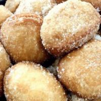 Large Malasadas · Warm, fluffy  Portuguese doughnuts. Made to order (sugar or cinnamon, or half and half (half...