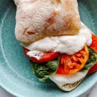 Caprese Sandwich · Ciabatta bread, heirloom tomatoes, mozzarella cheese, basil oil