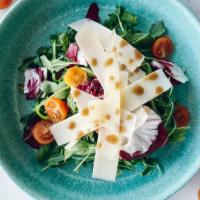 Tricolore Salad · Arugula, cherry tomatoes, radicchio, shaved parmesan, balsamic dressing