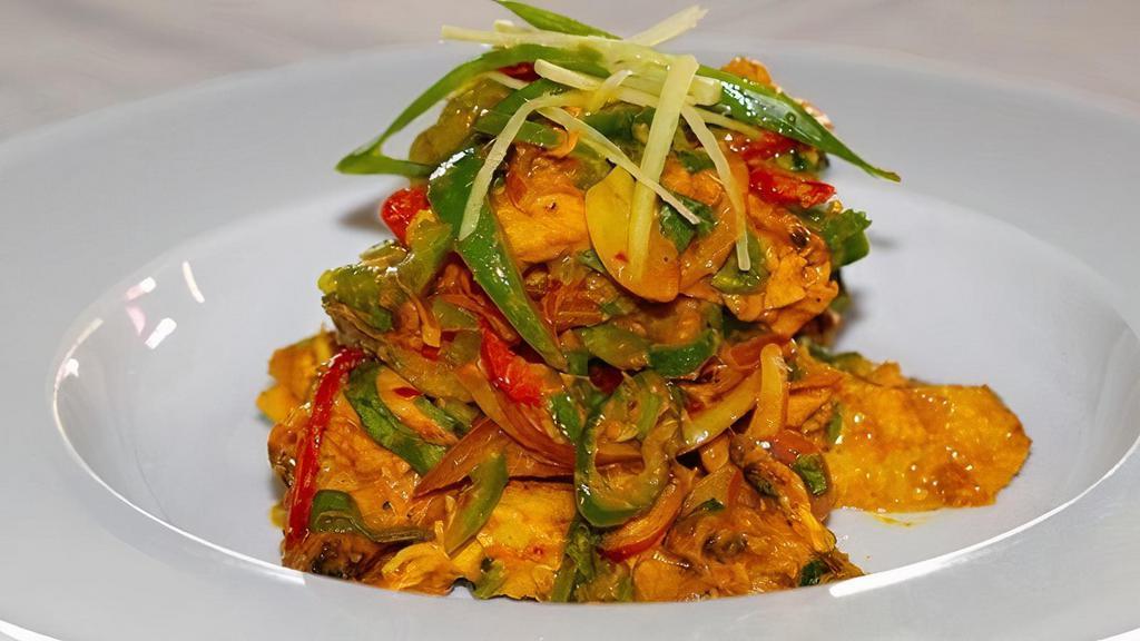 Chicken Choila · Chicken breast with marinated with himalayan sauce, bell pepper, onion, green onion, cooked in a clay oven with himalayan spices.