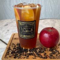 Eve’S Downfall · Sweetened apple flavored black tea with fresh apples.