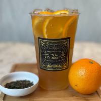 Tangerine Dream · A tangerine flavored green tea with fresh orange and sweetener.