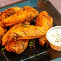 Cajun · 8 traditional wings tossed in Cajun dry rub (mild heat), served with  a dipping sauce of you...