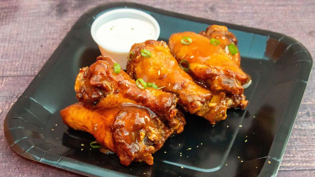 Sweet & Sour · 8 traditional wings tossed in Sweet & Sour sauce, served with a dipping sauce of your choice.