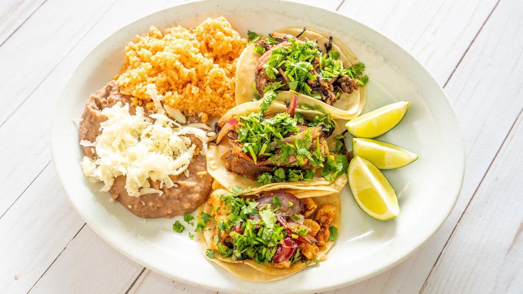2Nd Street Tacos · Gluten free. Three street tacos on mini corn tortillas - with grilled chicken, carnitas or carne asada, or a combo of all three. Topped with cilantro, caramelized red onion and roasted jalapeño on the side.