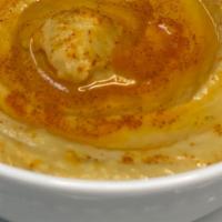Hummus · Blended garbanzo beans with tahini sauce.