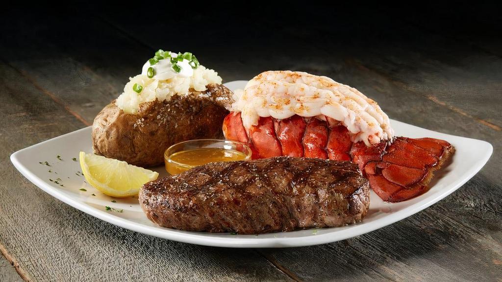 Steak & Lobster · Sizzler favorite - wild-caught cold water lobster tail served with at 8oz tri-tip sirloin and choice of side