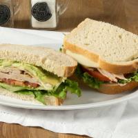 California · Premium roast turkey, provolone, fresh avocado, lettuce, tomato, red onion, mayo, mustard on...