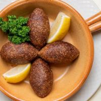 Kebbeh (Kofta) (4) · Each. Spheres of beef and cracked wheat, stuffed with minced meat, onion, and pine nuts.