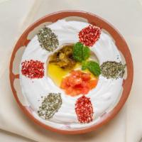 Labneh Harrah · Vegetarian. Yogurt cheese topped with pickled jalapeno, tomatoes, herbs, spices, and olive o...
