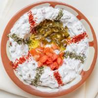 Labneh Khaleejhi · Vegetarian. Yogurt cheese with fresh mint, pickled peppers, tomatoes, and olive oil.