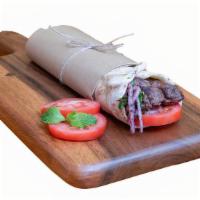 Lula Kebab · Minced beef or chicken, onion, parsley, tomatoes, and pickled turnips.