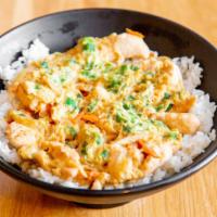 Chicken Bowl · White chicken meat with sweet soy sauce over steam rice and egg on top.