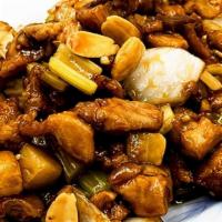 Almond Chicken · Dark meat chicken mixed in with our brown garlic sauce with almonds, celery, white onions, a...