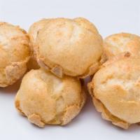 6 Minis · 6 mini cream puffs. Mini Puffs are a bite-sized cream puff filled with a choice of cream.