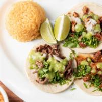 Plato De 3 Tacos Suaves · Three soft tacos with your choice of meat with rice and beans.