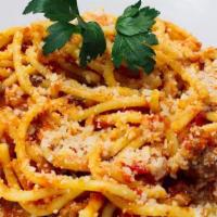 Spaghetti Bolognese · slow cooked Bolognese sauce with angus beef, basil, Parmesan