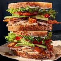 Turkey Avocado Sandwich · Turkey breast, avocado, lettuce, tomato, Swiss cheese, Mayo