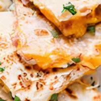 Cheese Quesadilla · mozzarella and cheddar, side of sour cream and salsa