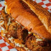 Meatball Sandwich - Sandwich · DoughBoys Red Sauce, Meatballs, Topped With Fresh Grated Mozzarella & Cheddar Cheese Blend