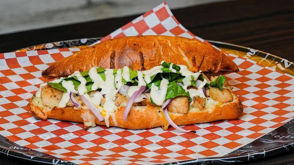 Roasted Garlic Chicken - Sandwich · DoughBoys Roasted White Sauce, Roasted Chicken, Fresh Grated Mozzarella & Cheddar Cheese Blend, Topped With Fresh Romaine Lettuce, Red Onions, and Creamy Garlic Ranch Spread