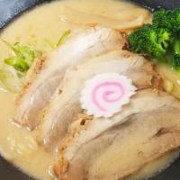 Tonkotsu Shoyu Ramen · Pork bone broth, shoyu base, garlic paste, thick noodle, pork chashu, green onion, bean spro...