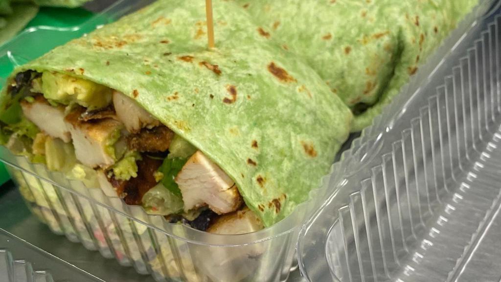 Chicken Caesar Wrap · Roasted chicken, romaine lettuce, shaved parmesan with caesar dressing in a spinach wrap.