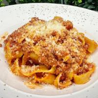  Pappardelle Bolognese · Homemade  Pappardelle ( large fettuccini )served with bolognese sauce .