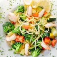 Shrimp Scampi · Shrimp sautéed in herb butter with fresh vegetables, garlic, and white wine. Served with pas...