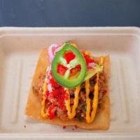 Won-Tostada · Gluten free option is available upon request. Favorite item. Spicy tuna, avocado, orange, pi...
