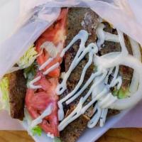 Gyro Wrap · Gyro Meat, Lettuce, Onion, Tomatoes, Salata, Tzatziki, Pita Bread