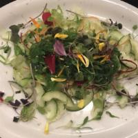 Seaweed Salad · Iceberg and spring mix cucumber shaved carrots and beets toasted sesame or ginger dressing.