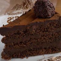 Slice Of Truffle Cake · An absolute must for chocolate lovers. Made with three layers of dense sour cream chocolate ...