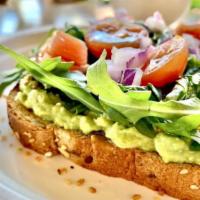 New Item! Traditional Avocado Toast · Organic whole grain and seed toast topped with avocado, arugula, Tomatoes, Onion, drizzle of...