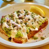 New Item! - Superfied Avocado Toast · Organic Whole grain and seed toast, topped with avocado, hemp seeds, pepitas, onions, drizzl...